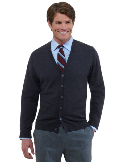 Extrafine Italian merino.  Classic, basic and versatile. Ribbed cuffs and hem. Knit lined pockets. Fully fashioned. Dry clean. Imported.