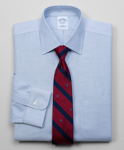 Pure lightweight cotton oxford made with pucker-free seams and specially treated to remain virtually wrinkle-free. Ainsley collar. Signature shirring at barrel cuffs. Center back pleat. Left chest pocket. Machine wash. Imported. Also available in Traditional fit.