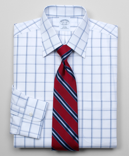 Pure cotton broadcloth made with pucker-free seams and specially treated to remain virtually wrinkle-free. Hamilton collar. Signature shirring at barrel cuffs. Center back pleat. Left chest pocket. Machine wash. Imported. Also available in Traditional fit.