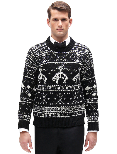 Pure merino wool woven in Ireland. Locker loop at back neck. Dry clean. Imported.