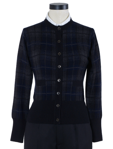 Pure Scottish cashmere. Mother-of-pearl buttons. Button cuff with grosgrain on sleeve and placket. Locker loop at back neck. Dry clean. Imported.