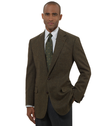 A classic Brooks Brothers sport coat tailored from lambswool woven in England. 2-button, center vent. Madison fit. Leather wrapped buttons. 100% Bemberg lining. Dry clean. Imported.