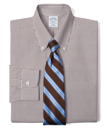 Pure cotton broadcloth made with pucker-free seams and specially treated to remain virtually wrinkle-free. The original Polo� button-down collar. Signature shirring at barrel cuffs. Center back pleat. Left chest pocket. Machine wash. Imported. Also available in Traditional fit.