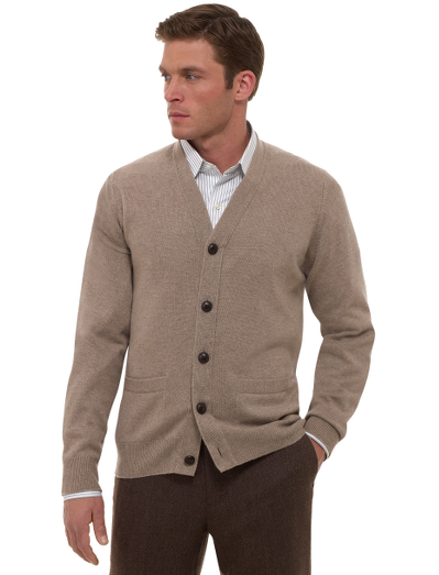 Pure cashmere spun and dyed in Scottland. Knitted at one of the oldest Scottish knitters in existence. Sweaters are washed in water from the River Tweed for added softness. Each sweater is hand-finished. Classic button-front cardigan style with genuine woven leather buttons. Fully fashioned. Hand wash or dry clean. Imported.