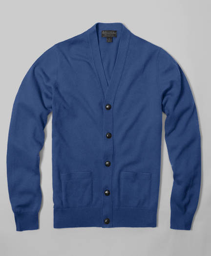 Pure cashmere spun and dyed in Scottland. Knitted at one of the oldest Scottish knitters in existence. Sweaters are washed in water from the River Tweed for added softness. Each sweater is hand-finished. Classic button-front cardigan style with genuine woven leather buttons. Fully fashioned. Hand wa