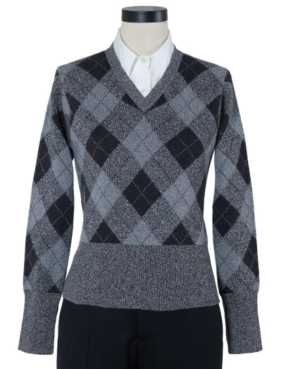 Pure Scottish cashmere. Button cuff with grosgrain on sleeve. Mother-of-pearl buttons. Locker loop at back neck. Dry clean. Imported.