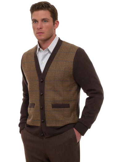 Pure cashmere spun and dyed in Scotland. Front panel made from Scottish tweed wool. Genuine leather buttons. Dry clean. Imported.