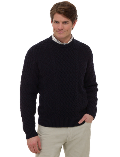 Knitted from pure Saxxon wool which is renowned for its unsurpassed softness, natural stretch. It is extremely lightweight with a cashmere touch. Classic fisherman's cable crewneck. Fully fashioned. Dry clean. Imported.