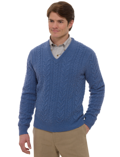 Knitted from pure Saxxon wool which is renowned for its unsurpassed softness, natural stretch. It is extremely lightweight with a cashmere touch. Updated cable layout in a v-neck body. Fully fashioned. Dry clean. Imported.