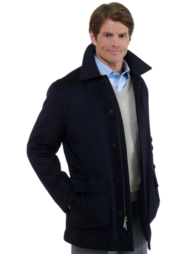Pure wool. Loro Piana Storm System fabric. 3/4 length style. Full zip with button over placket. Convenient interior and exterior pockets. Treated to be wind and water resistant. Cord management system for a cell phone or MP3 player. Special care instructions listed on garment. Fabric woven in Italy.
