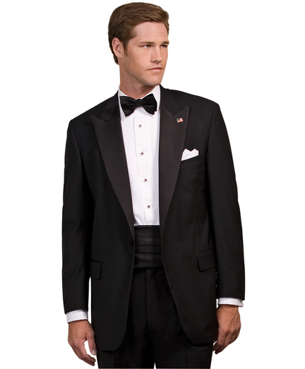 1-button peak lapel jacket with satin covered buttons. Pleated trousers. Dry clean only. Made in the USA.