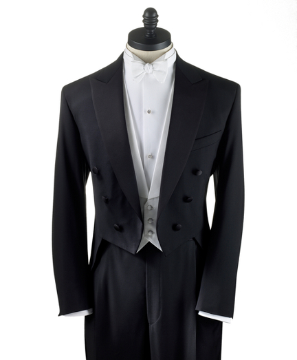 Pure wool. Pleat-front trousers. Dry clean. Made in the USA.
