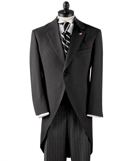 Pure wool.  Vest and pleat-front striped trousers. Dry clean. Made in the USA.