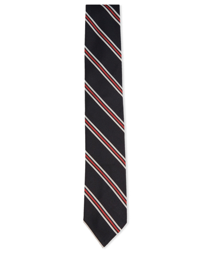 Silk and cotton from Italy. 2 1/4" width.  Grosgrain trim at neck. Made in the USA.