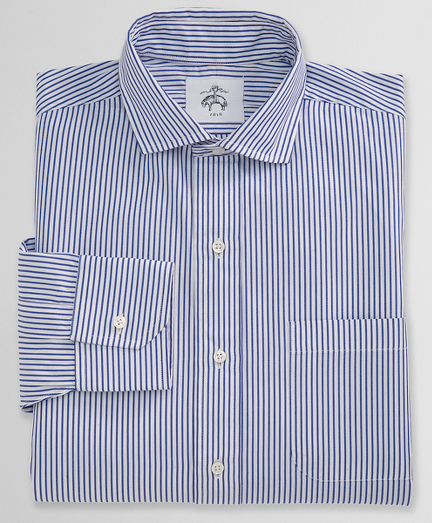 Pure pinpoint cotton. Spread collar. Mitered cuffs. Side gussets. Mother-of-pearl buttons. Locker loop at back neck. Machine wash warm. Made in the USA.