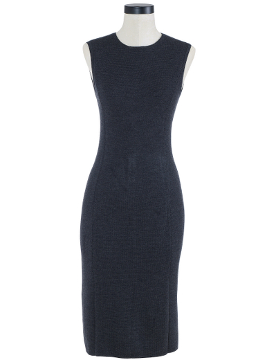 Pure Merino Wool. Mother of Pearl Buttons. Falls below knee. Dry Clean. Imported.