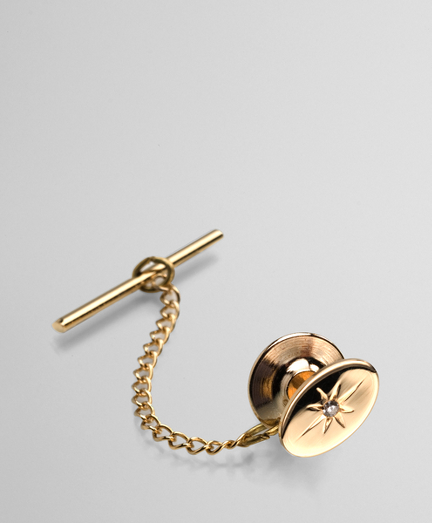 14KT gold. Genuine diamond. Made in the USA.
