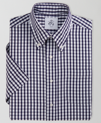 Pure cotton broadcloth. Button-down collar.  Notched sleeve opening. Mother-of-pearl buttons. Locker loop at back of neck. Machine wash.  Made in the USA.