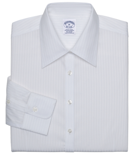 Fitted silhouette, slightly tailored for a slimmer appearance. Woven in cotton. Traditional placket. Pucker-free seams. Front and back darts. Forward point collar and shirred barrel cuffs. Machine wash. Imported.
