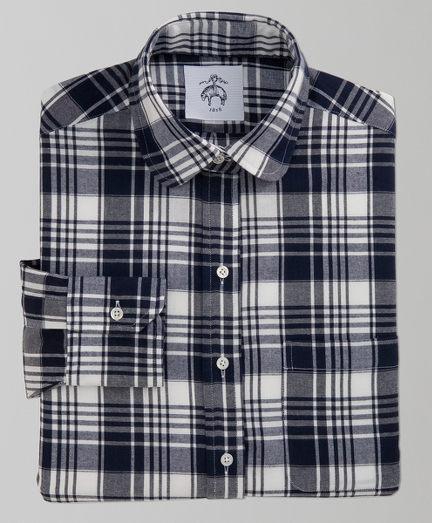 Cotton. Mother-of-pearl buttons. Signature locker loop at neck. Machine wash. Made in the USA.