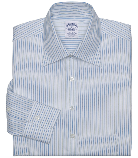 Fitted silhouette, slightly tailored for a slimmer appearance.  Woven in cotton with a touch of  DOW XLA  for stretch, treated to remain virtually wrinkle-free. Front and back darts. Traditional placket. Forward point collar and French cuffs. Machine wash. Imported.