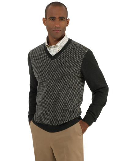 Pure lambswool. Classic crewneck body. Fully fashioned. Dry clean. Imported.