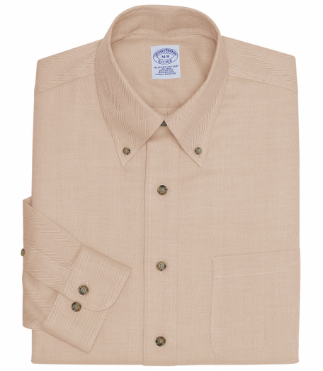 Luxurious blend of cotton and cashmere. Made with pucker-free seams and treated to remain virtually wrinkle-free. The original Polo� button-down collar. Center front placket. Signature shirring at barrel cuffs. Left chest pocket. Superdurable faux horn logo buttons. Available in regular and long sleeve lengths. Machine wash. Imported.