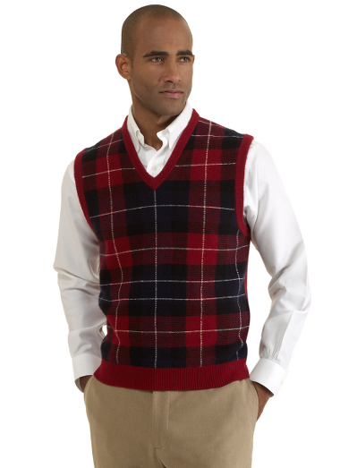 Pure Scottish Lambswool. Classic vest body in a traditional tartan plaid pattern. Ribbed hem. Fully fashioned. Dry clean. Imported.