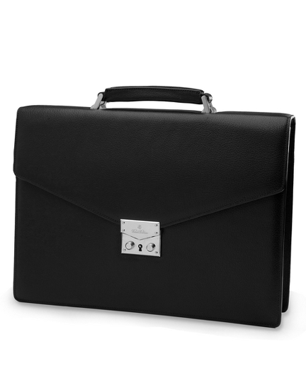 Genuine buffalo leather.  Front lock. Black has silver hardware and brown has gold hardware. Imported. 16" x 4" x 11".