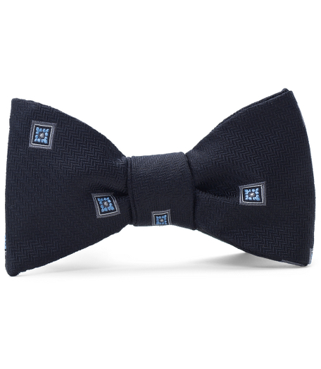 Pure silk woven in Italy. Self tie. Dry clean. Made in the USA.