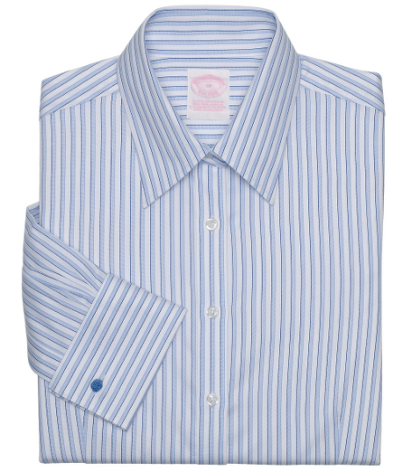 Tailored fit, our slimmest fit. Cotton, specially treated to remain virtually wrinkle-free, with a touch of  DOW XLA for stretch. Slightly longer shirttail. Traditional placket. Pucker-free seams. F ront and back darts. Forward point collar. Shirred barrel cuffs. Machine wash. Imported.