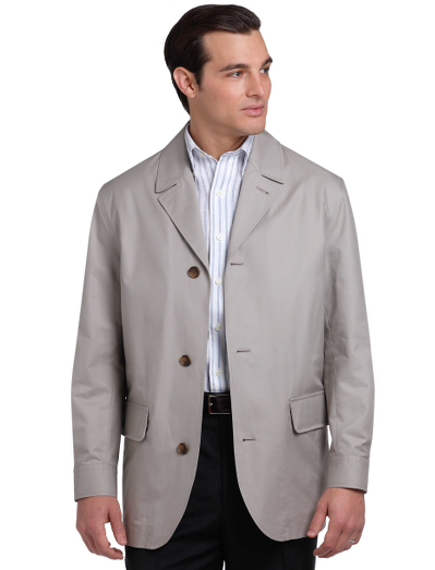 Pure lightweight cotton shell. Water resistant. Oxford lining. Button-front with draw cord at waist. Transparent interior cell phone pocket. Dry clean. Imported.
