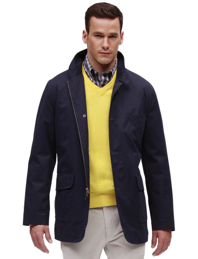 Pure cotton lined in cotton Black Watch plaid. Action-back and side vents. Dry clean. Imported.