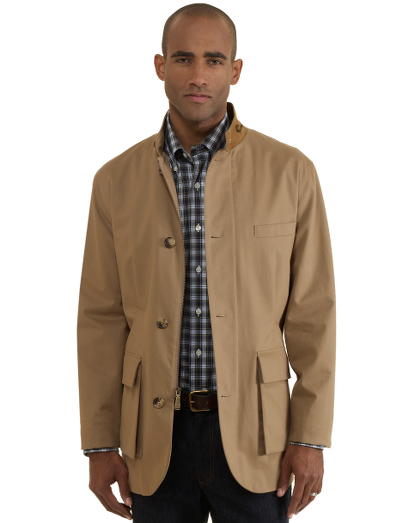 Pure cotton lined in cotton district check. Action back, side vents. Dry clean. Imported.