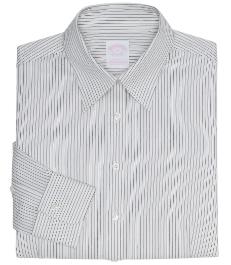 Tailored fit, our slimmest silhouette, woven in coton specially treated to remain virtually wrinkle-free, with a touch of  DOW XLA for stretch. Forward point collar and shirred barrel cuffs.  Traditional placket, slightly longer shirttail and pucker-free seams.   Front and back darts. Machine wash.  Imported.