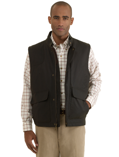Made of authentic waxed cotton fabric from British Millerain. Signature plaid lining. Corduroy details. Zip front and snap closure. Hand wash. Imported. Reproofing tin included for care of garment.