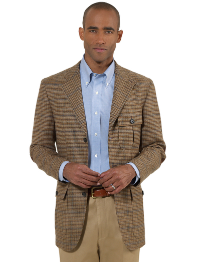 Pure wool woven in Scotland at the Robert Noble mill. Sport jacket styling with action back and side vents. Faux suede elbow patches. Dry clean. Imported