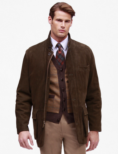 Made of silky goat suede. Brown wool herringbone lining. Zip and button front. Stand-up collar. Professional leather clean only. Imported.