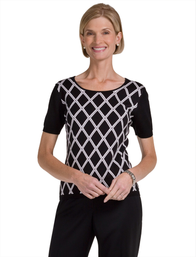Silk/cotton. Ribbing at neck and hem. Dry clean. Imported.