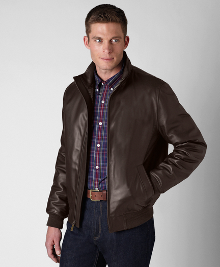 Genuine lambskin, Lined in 100% Bemberg. Classic bomber silhouette. Zip-front with ribbed waistband and cuffs. Professional leather clean only. Imported.