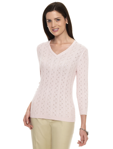 Silk/cotton. V-neck. Ribbing at neck, cuff and hem. White tipping at cuff. Alternating baby cable detail. Dry clean. Imported.