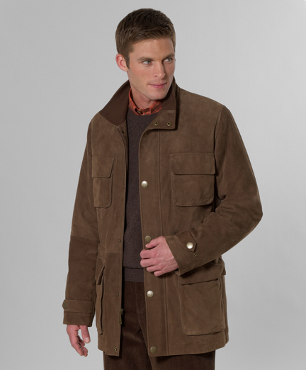 Genuine silky goat suede with diamond quilted Bemberg lining. Zip and snap front with drawstring at waist. Ribbed knit at interior neck and action back for added comfort. Multiple interior pockets. Professional leather clean only. Imported.