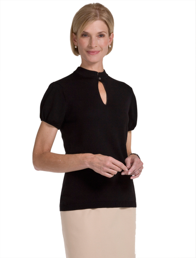 Silk/cotton. Mandarin collar. Puff sleeve. Mother-of-pearl buttons.  Keyhole opening in front with ribbed hem and cuff. Dry clean. Imported.