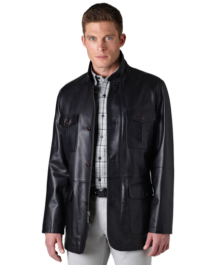Genuine lambskin, Lined in 100% black Bemberg. Stand collar. Zip-front and button-front. Professional leather clean only. Imported.