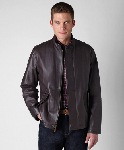 Genuine lambskin, Lined in 100% Bemberg. Stand collar. Short zip style with self-band at back for a more slimming look. Professional leather clean only. Imported.