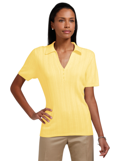 Silk/cotton. Polo collar. Mother-of-pearl buttons. Cable pattern. Ribbed hem and cuff. Dry clean. Imported.