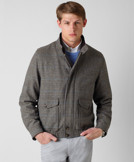 Bomber style in pure wool. Zip front with knit bottom and cuff opening. Action back for added comfort. 100% twill Bemberg lining. Dry clean. Imported.