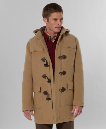 Classic duffel coat styling in pure wool with plaid lining. Shorter length for a more modern look. Zip front with genuine horn toggle closure. Single-button closure at neck, center back vent and attached hood. Dry clean. Imported.