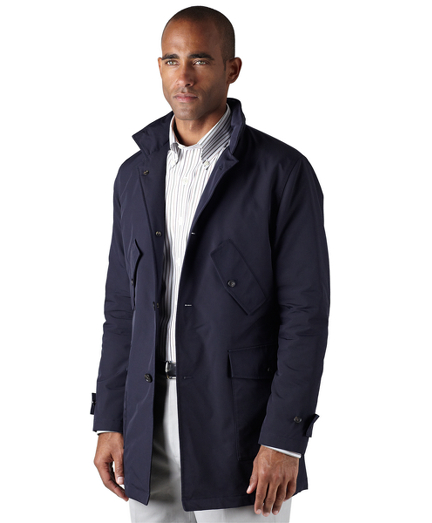 Nylon lined in polyester. Button-front, hidden hood and center back vent. Slim fit. Machine wash. Imported.