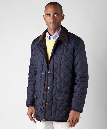 Quilted body in polyester with primaloft fill and fun plaid lining. Corduroy details at neck, sleeve opening and bottom hem. Snap front closure. Dry clean. Imported.